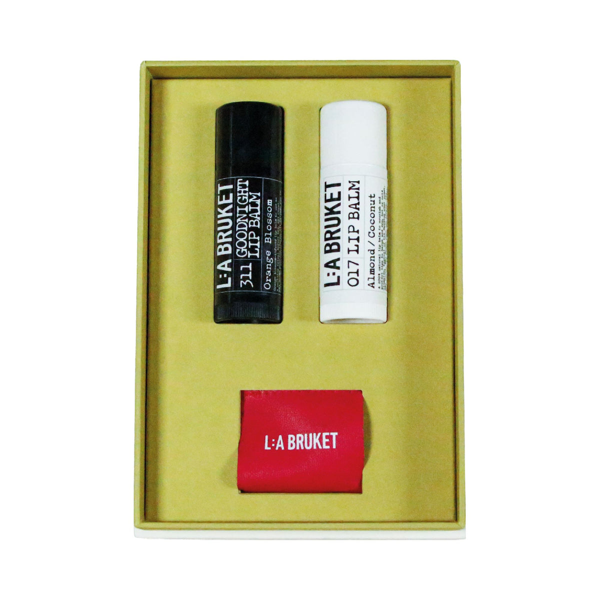 L:A BRUKET Little Traveller – Geschenkbox mit zwei Lippenbalsamen und Halter